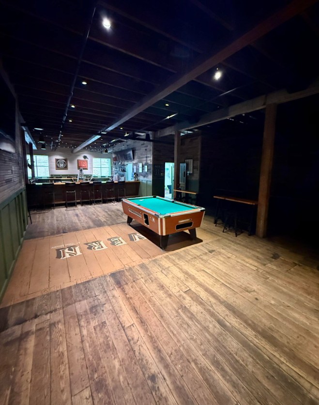 Coin-operated pool table at PG Tavern in Corinth, Mississippi