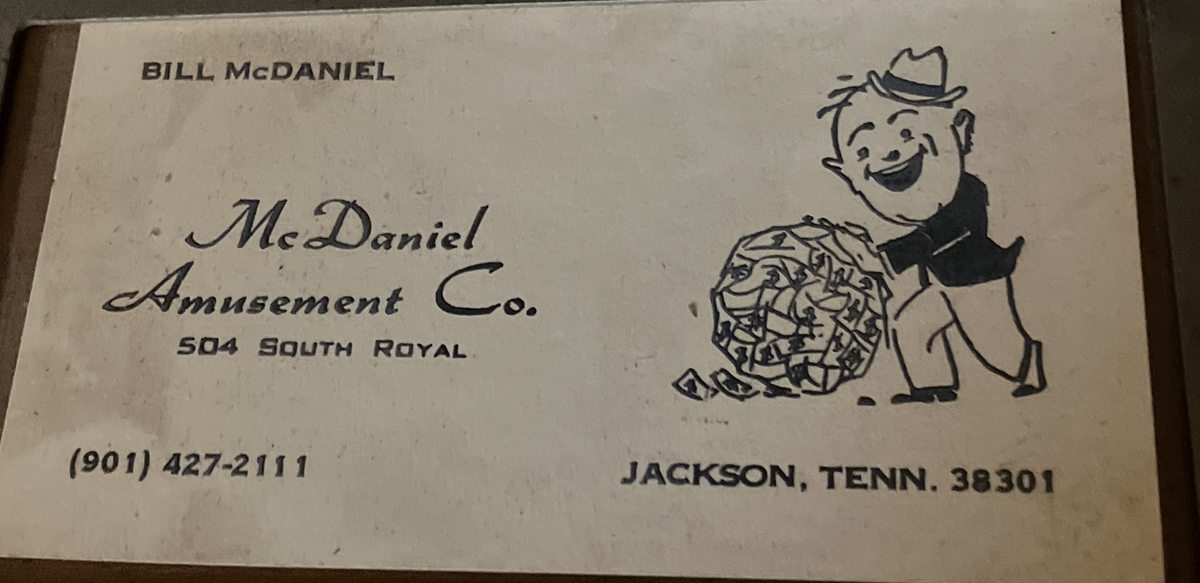 Bill McDaniel&rsquo;s original McDaniel Amusement Co. business card, Jackson, Tennessee, with the cash-ball mascot